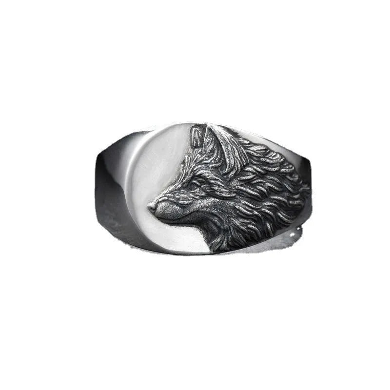 Men's silver geometric wolf head alloy ring shown on a finger, showcasing its retro design.