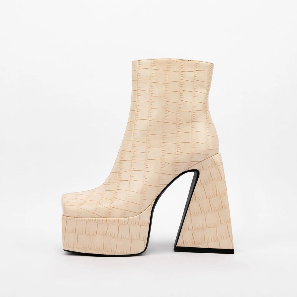 Women's artificial PU ankle boots with high heel above 8cm in beige, showing solid colour design.