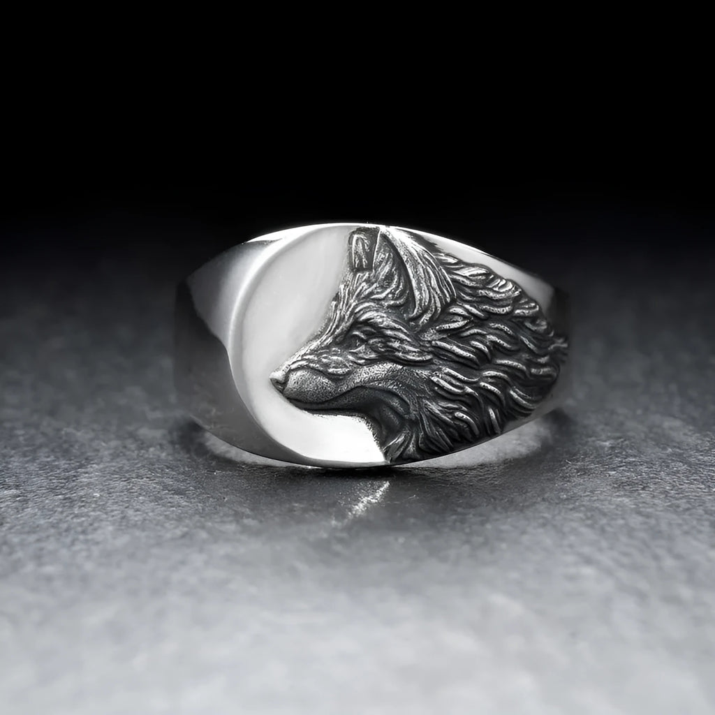 Men's silver geometric wolf head alloy ring shown on a finger, showcasing its retro design.