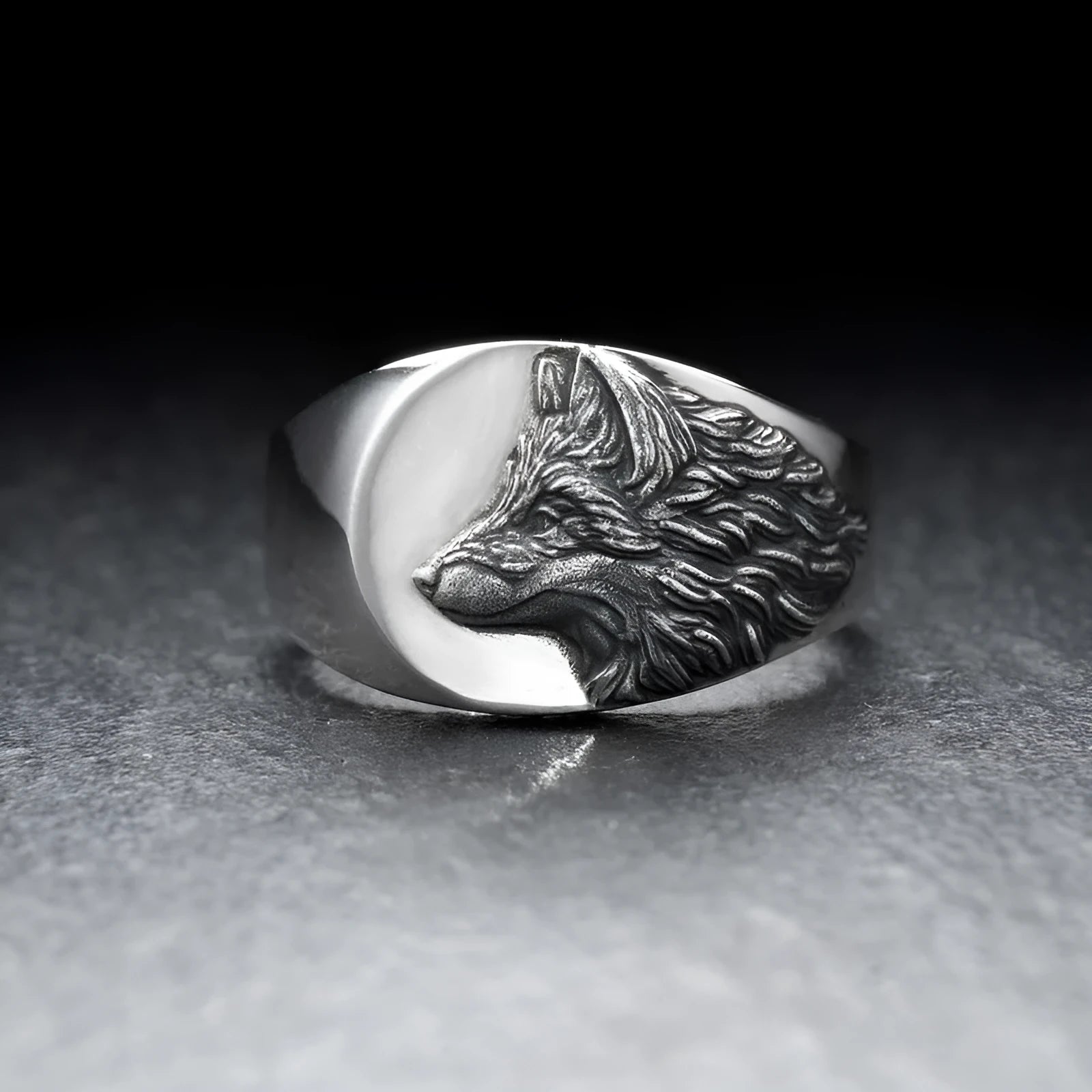 Men's silver geometric wolf head alloy ring shown on a finger, showcasing its retro design.