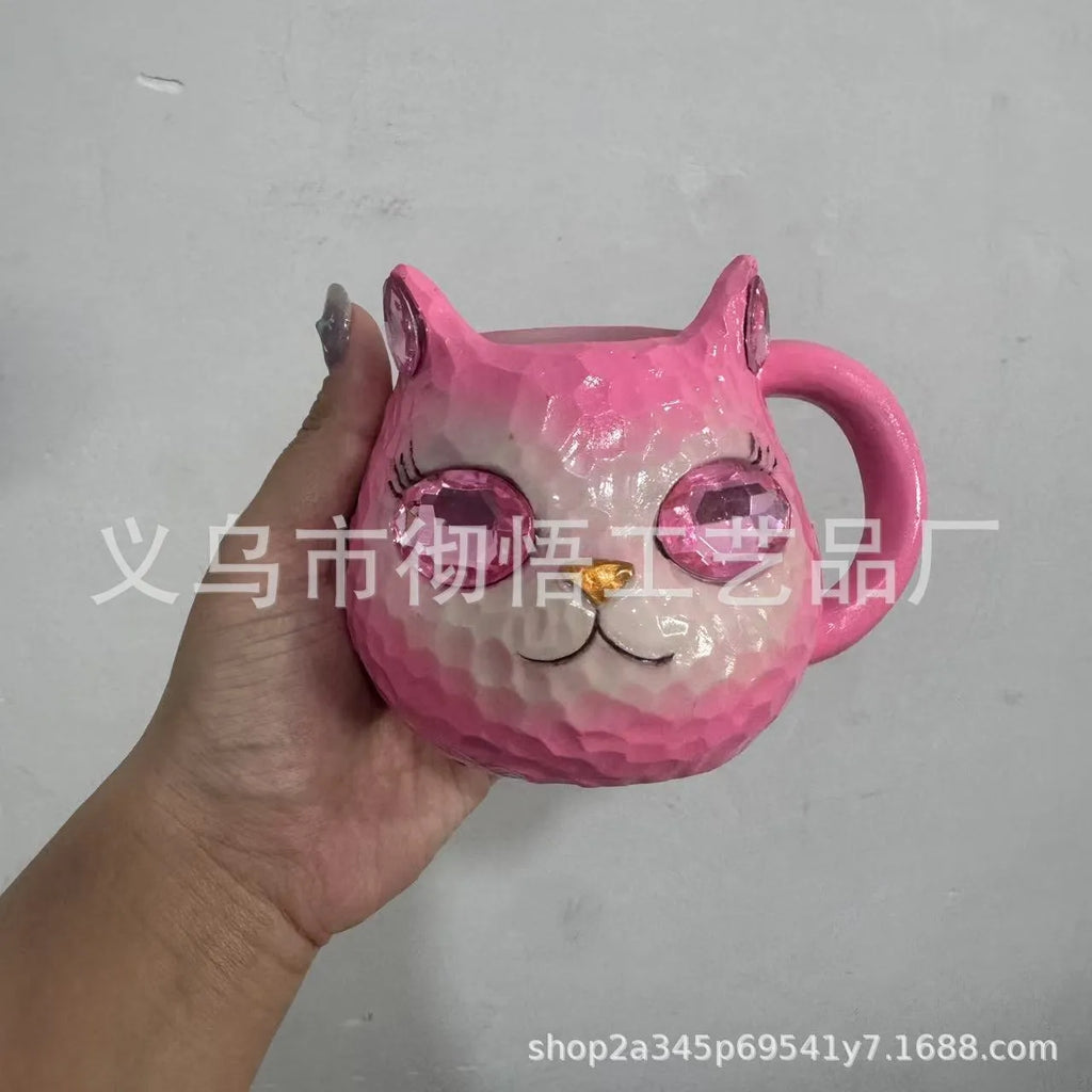 Crystal Earth Cat Cup resin craft decorative object in purple, green, blue, or pink colours.