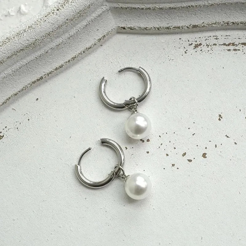 Geometric alloy pearl drop earrings with titanium steel posts and round pearl decorative elements
