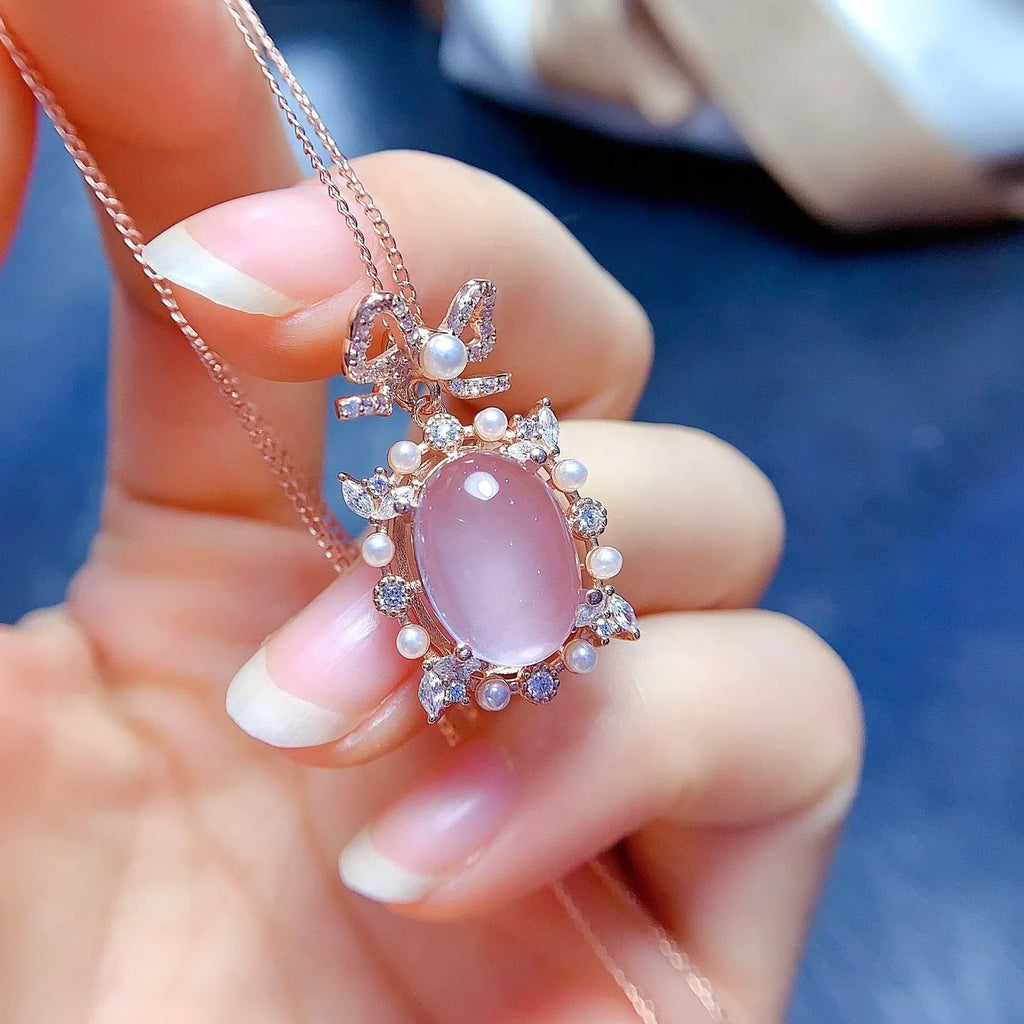 Geometric rose quartz pendant necklace in rose gold plated silver on a chain