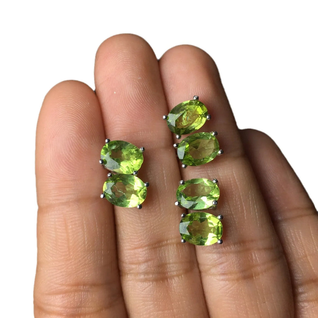 Natural grass green olivine stud earrings in S925 sterling silver with 6x8mm oval stones.