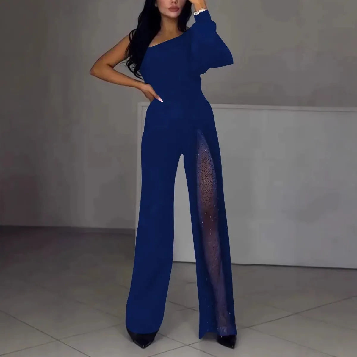 Women's black oblique shoulder jumpsuit with high slit detail and long sleeves