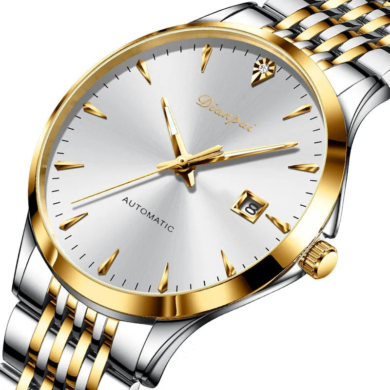 Men's simple dial automatic watch with stainless steel strap on a wrist.