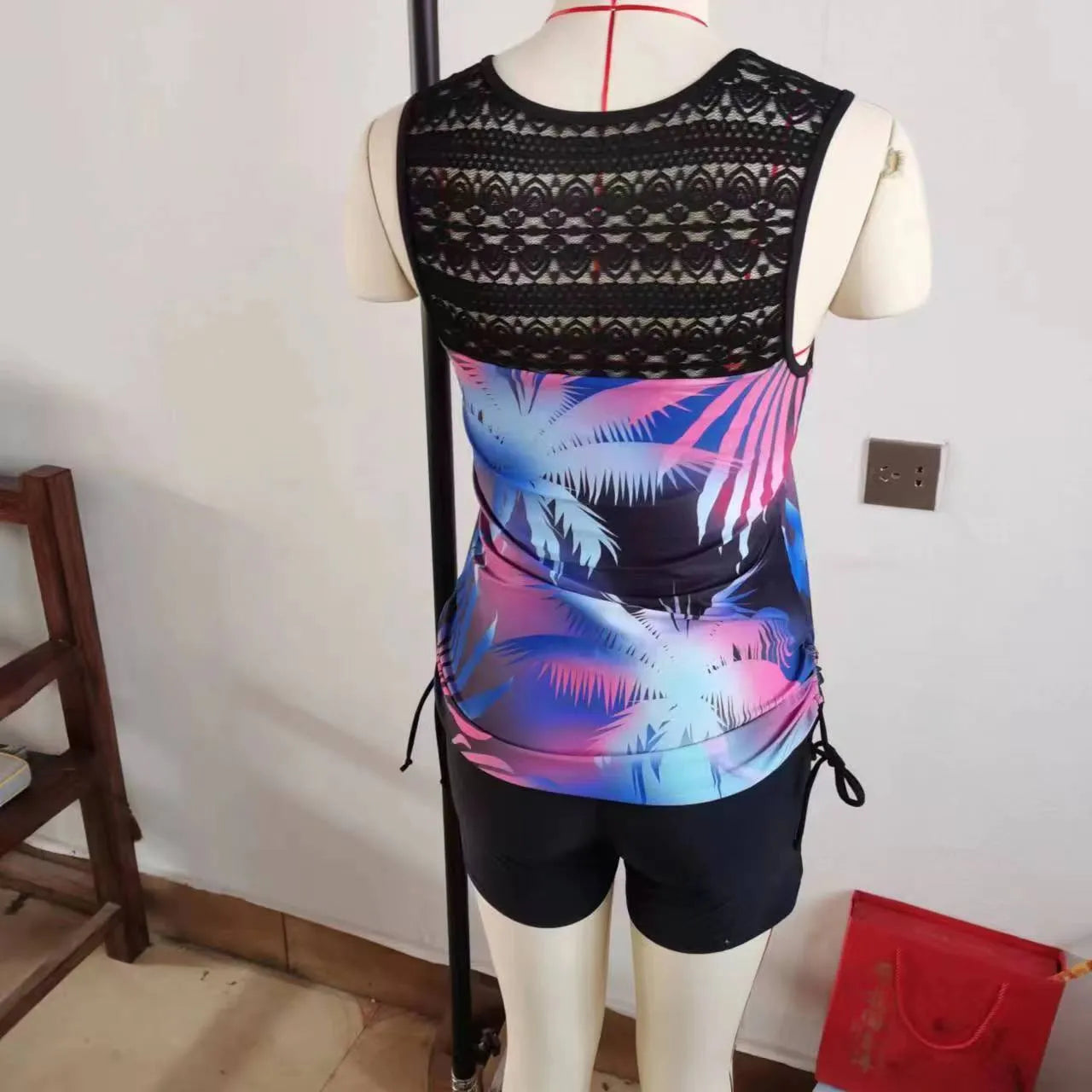 Women's printed lace two-piece swimsuit with floral pattern in blue colour