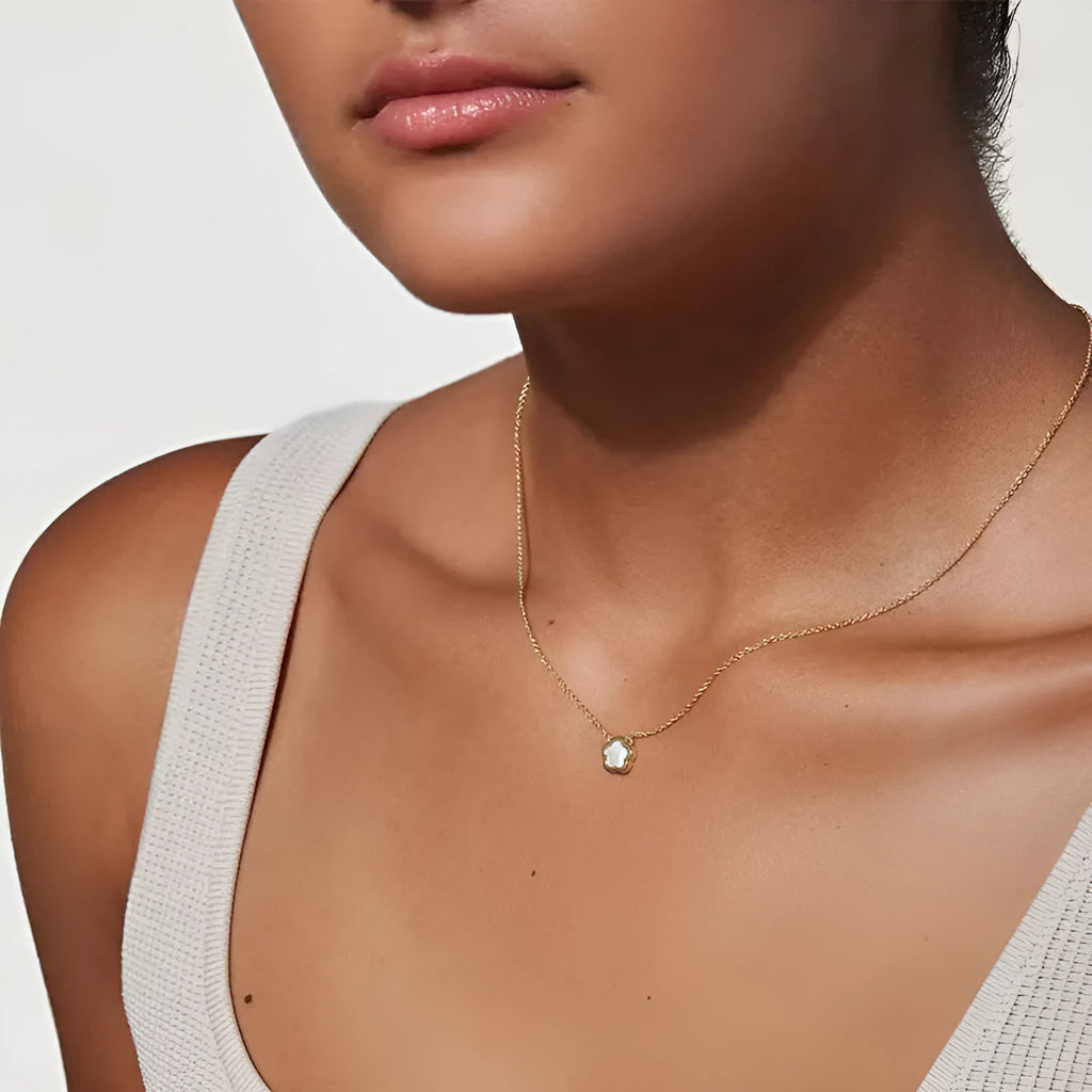 Women's flower necklace with white mother shell pendant on copper chain in gold and silver tones