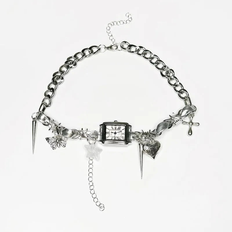 Dark electroplated women's necklace with layered chains, cross pendant, and adjustable length