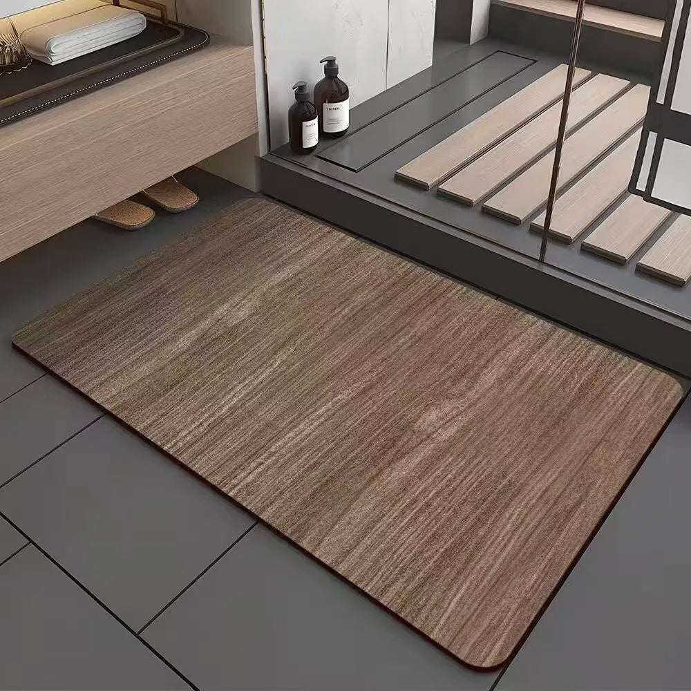 Square diatomite bathroom floor mat with geometric wood grain pattern, shown in a washroom setting.
