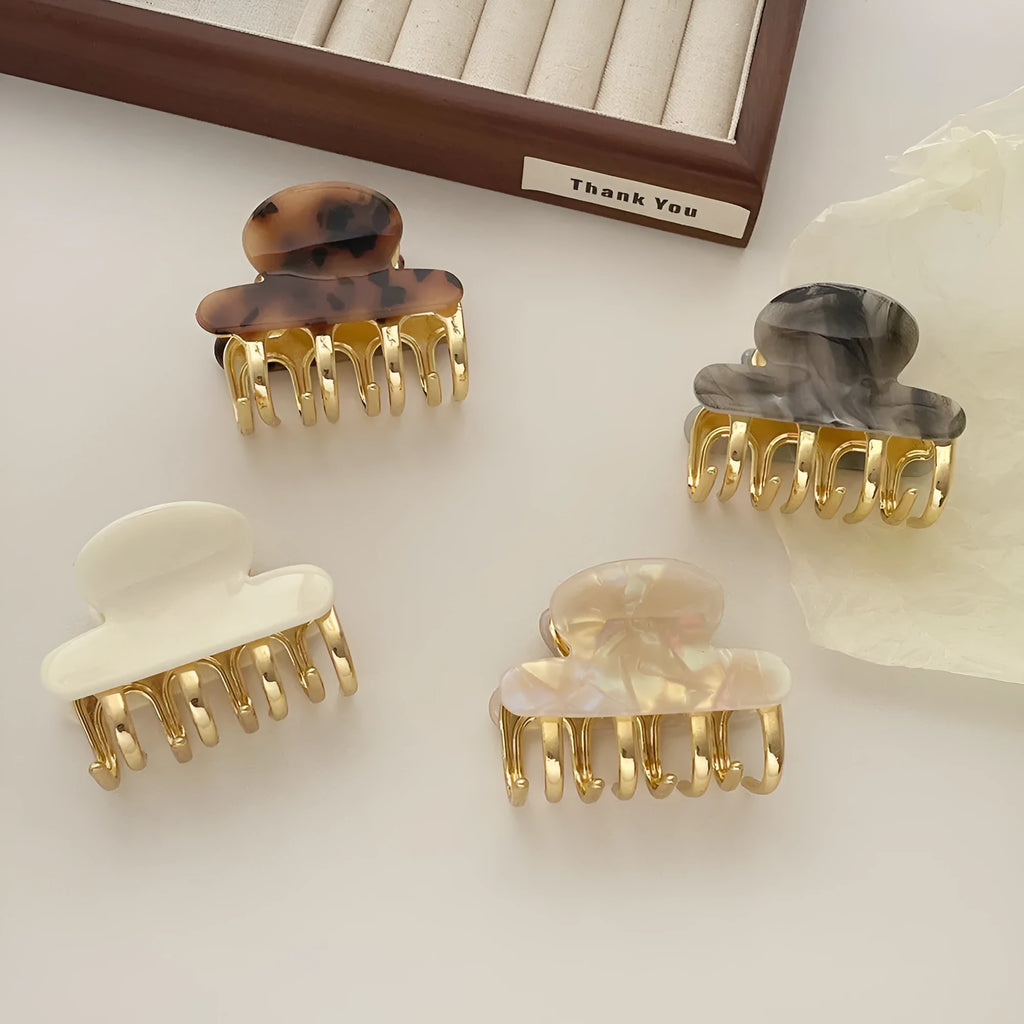 Set of four dopamine retro acetate hair barrettes in R08 colours with medium metal grip