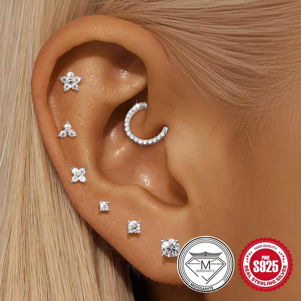 Sterling silver petal diamond stud earrings with geometric debris design and ear clip back