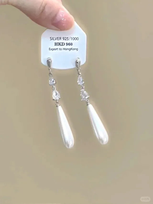 Geometric heart shape alloy earrings with rhinestone star tassel ear clip design for women