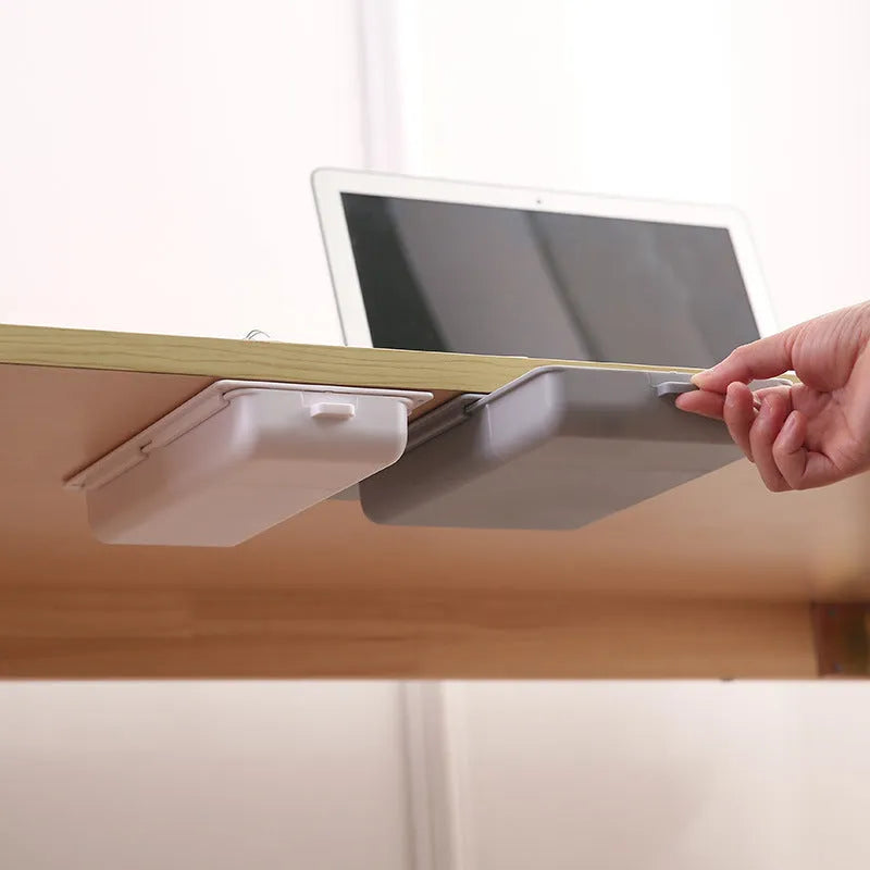 White plastic under table storage box with drawer lid and adhesive base for hidden organisation