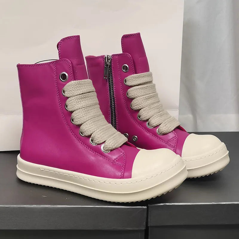 Genuine leather high-top sneakers with side zipper in black, shown on a casual outfit.