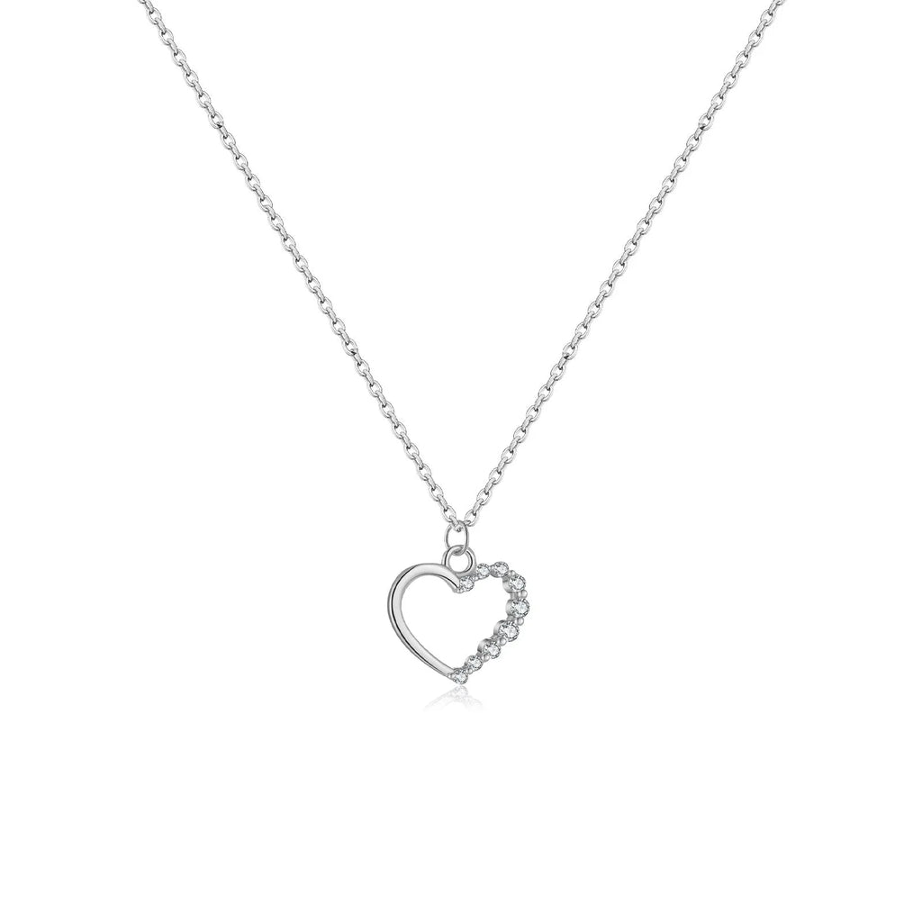 S925 sterling silver hollow heart pendant necklace on a regular chain, available in white gold or 18K gold finish.