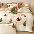 Bright yellow fleece-lined four-piece bedding set with a cartoon winter Christmas tree pattern.