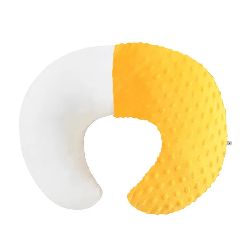 Nursing pillow with integrated spill barrier in a choice of pink, yellow, grey, or light blue colours.