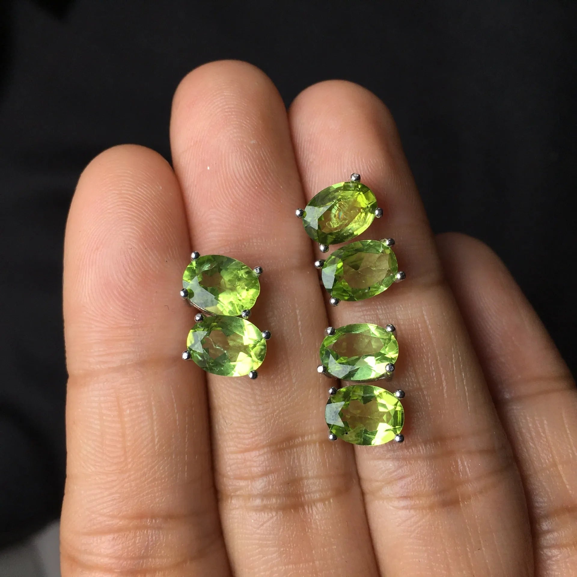 Natural grass green olivine stud earrings in S925 sterling silver with 6x8mm oval stones.