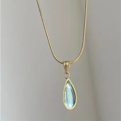 Retro titanium steel necklace with a blue or green water drop pendant featuring a mixed gem inlay.