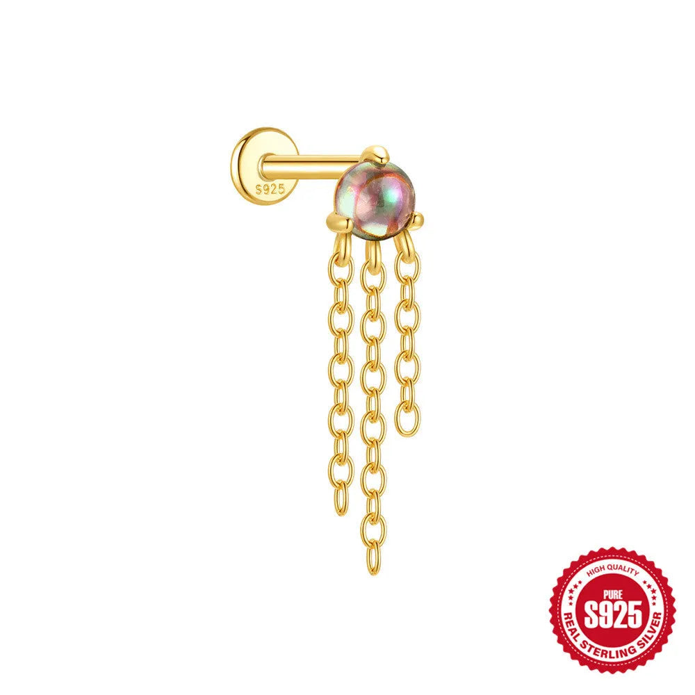 S925 sterling silver flat head thread piercing with a shiny rainbow stone in a gold setting.