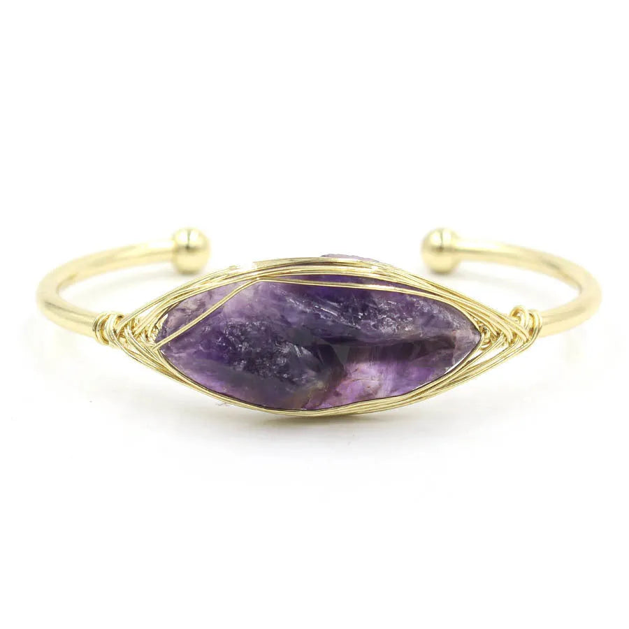 Natural raw gemstone bracelet with winding crystal design showing 8mm stones in various colours