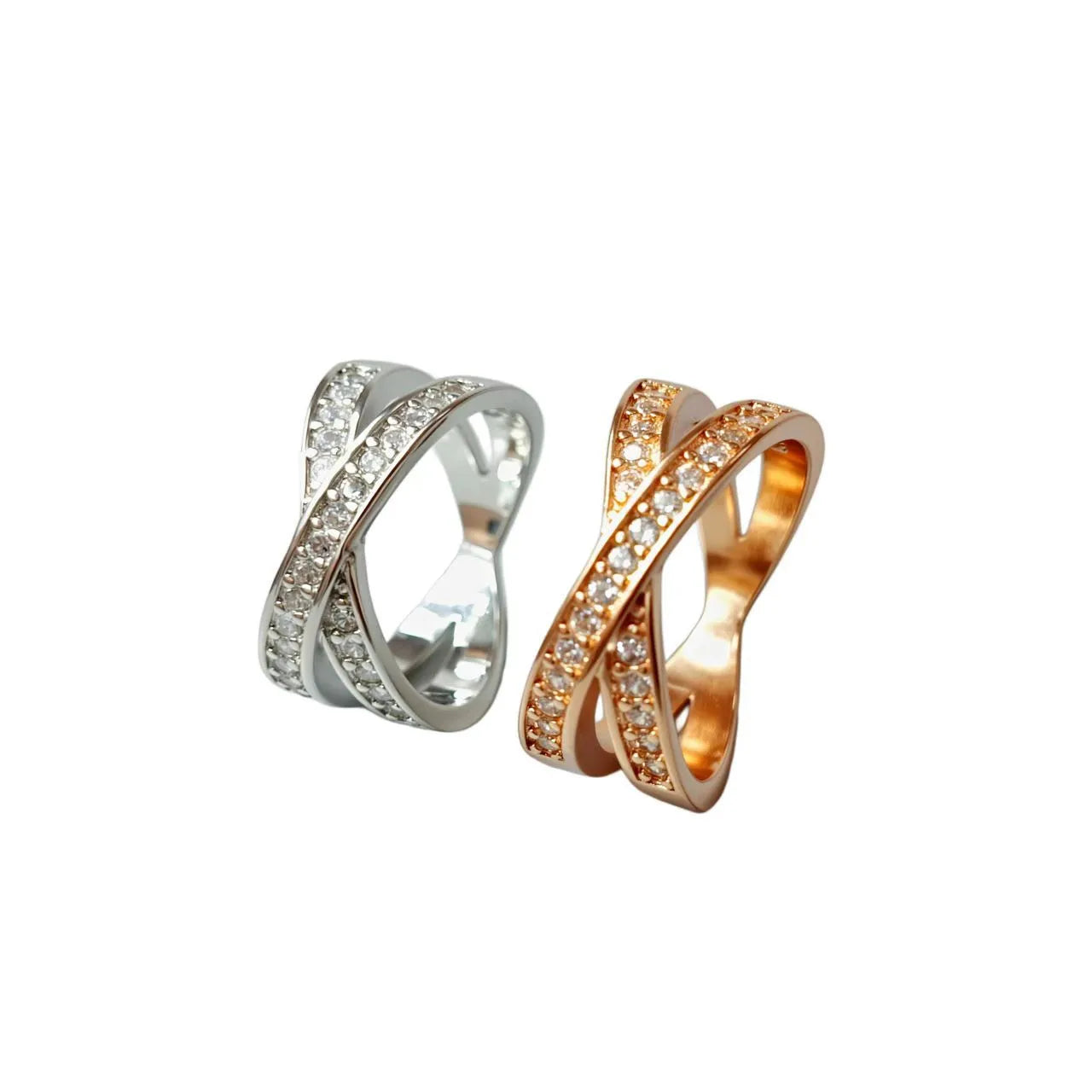 Simple geometric copper cross ring with micro-inlaid zircon stones in silver or rose gold finish.