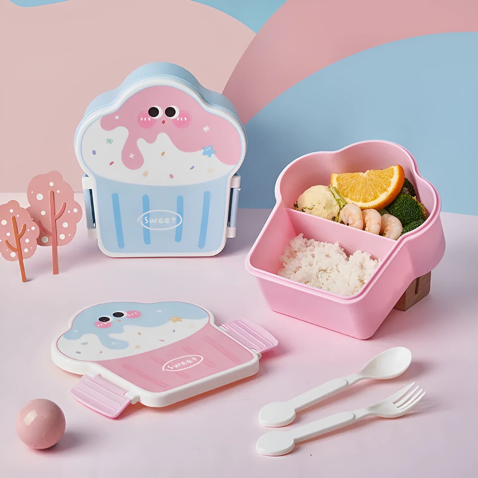 Creative ice cream shaped plastic lunch box with compartments in pink or blue, includes spoon and fork