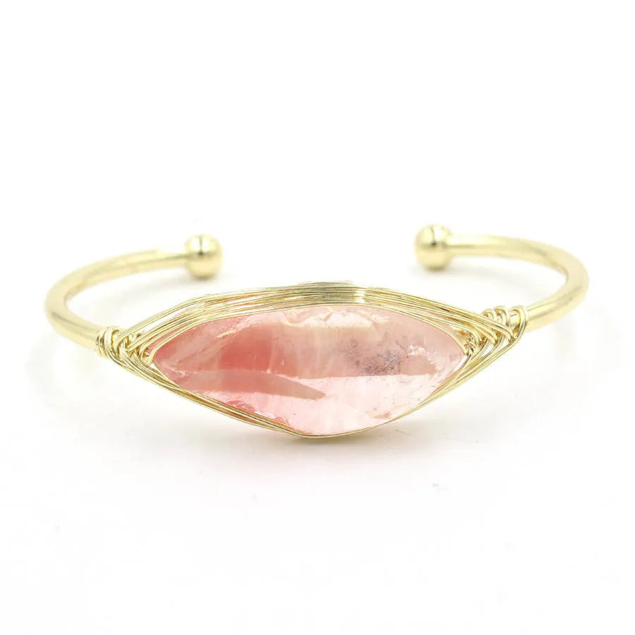 Natural raw gemstone bracelet with winding crystal design showing 8mm stones in various colours