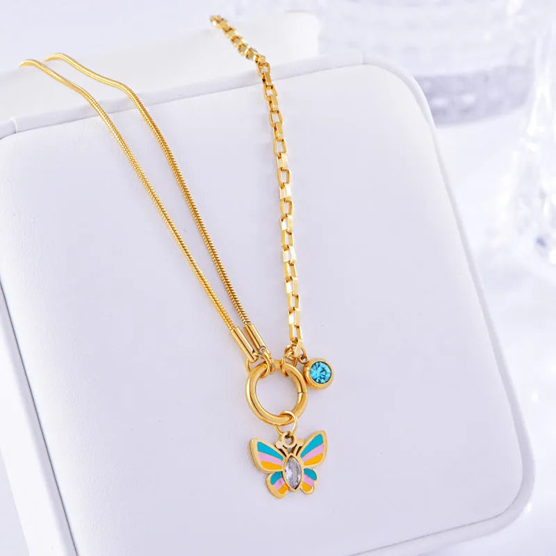 Gold epoxy butterfly necklace and bracelet set with titanium steel construction and zodiac animal pendant
