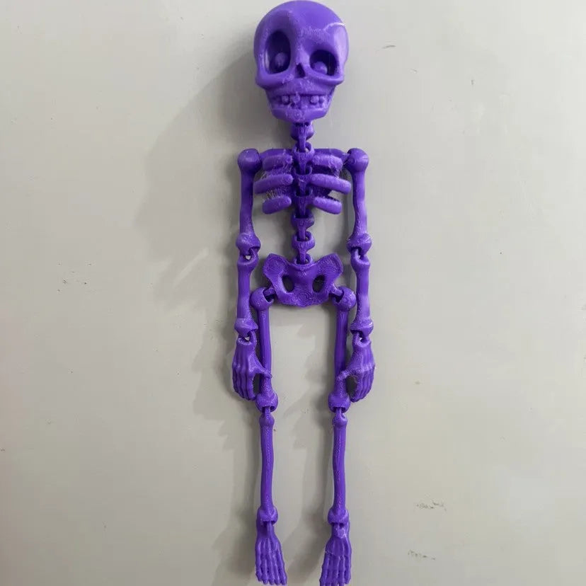 3D printed skull refrigerator magnet in various colours measuring 18cm tall