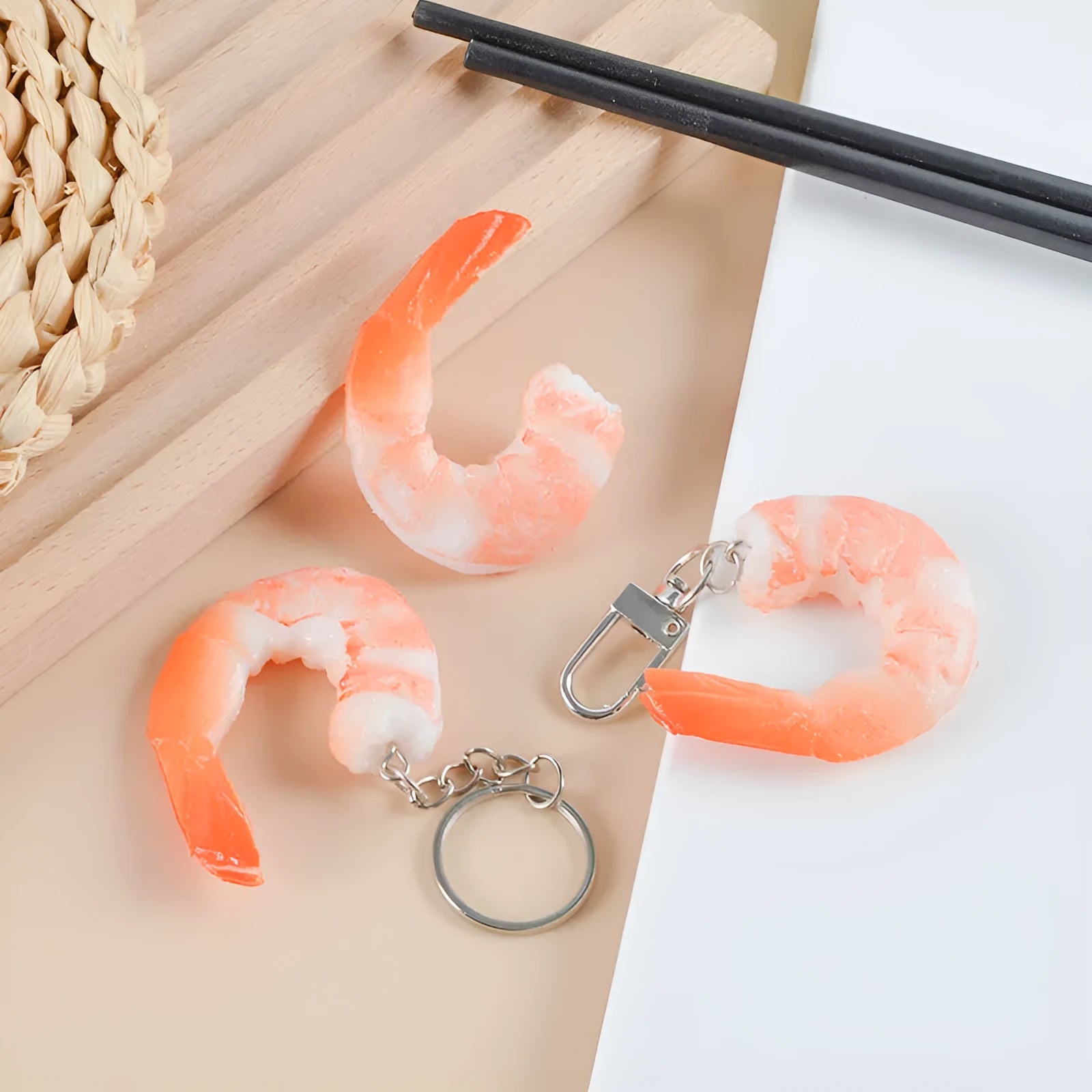 PVC injection moulded shrimp-shaped keychain with door buckle, 1.5cm thick.
