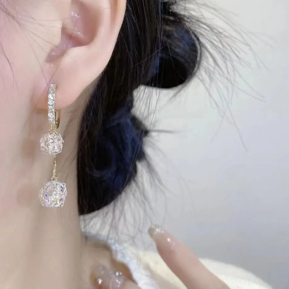 Women's confession balloon earrings with tassel and rhinestone ball pendants in silver colour
