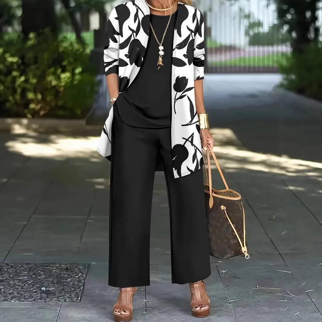 Women's blue Japanese Korean style three-piece suit comprising a long sleeve coat, vest, and trousers.