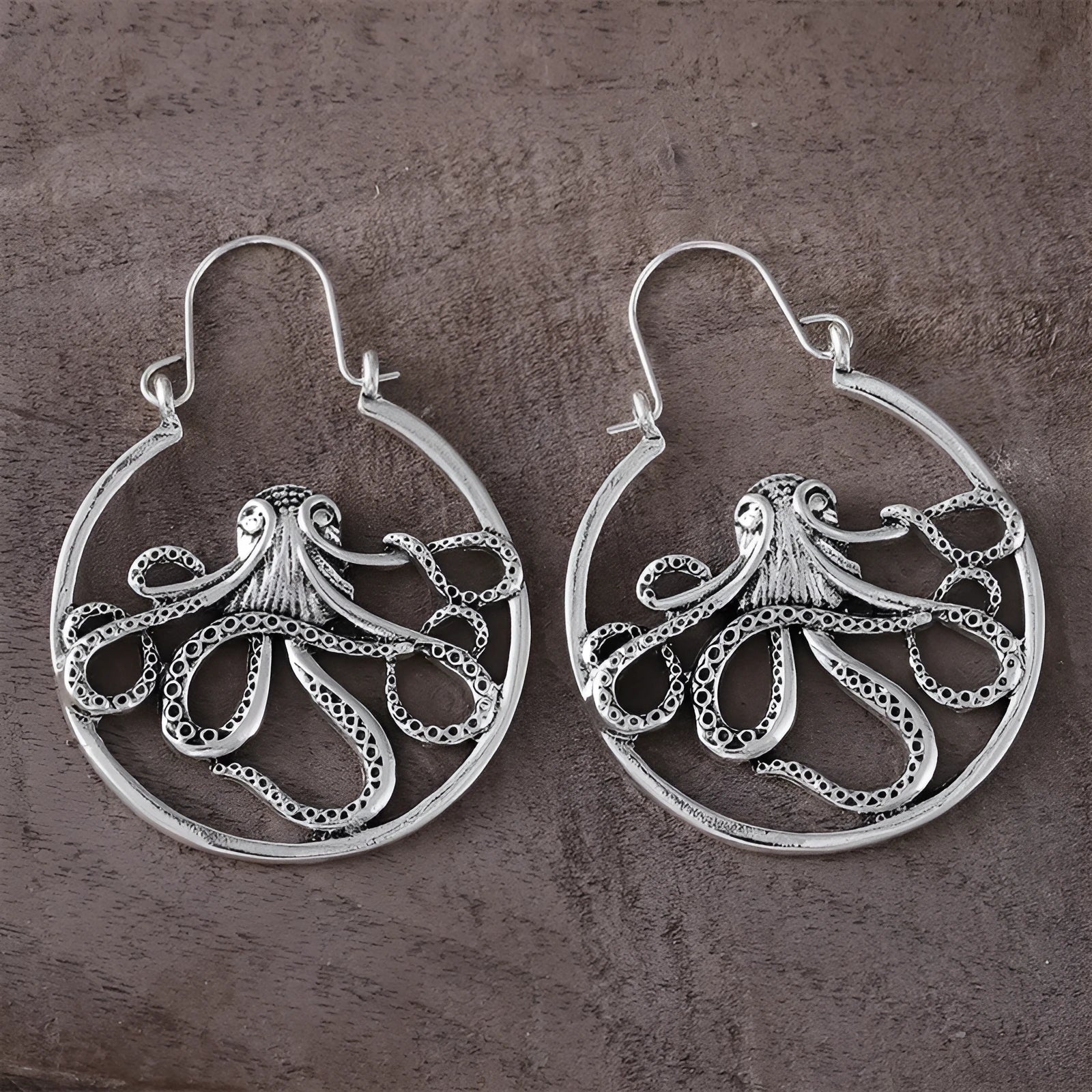 Vintage octopus earrings with antique silver electroplated finish and detailed animal modelling