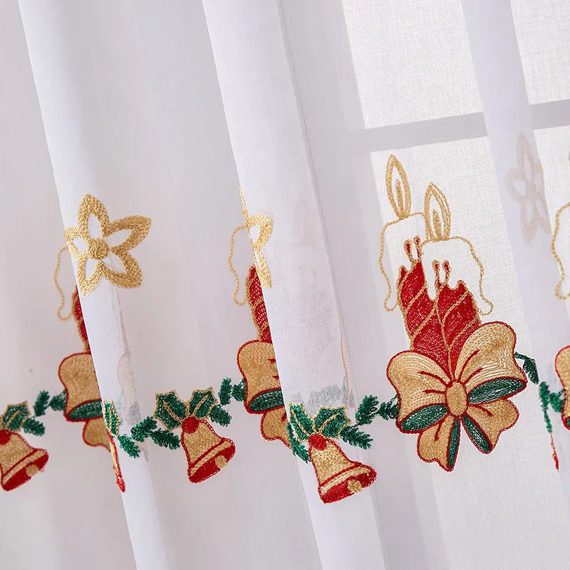 Pair of white Christmas curtains with red and green embroidered American-style snowflake design.