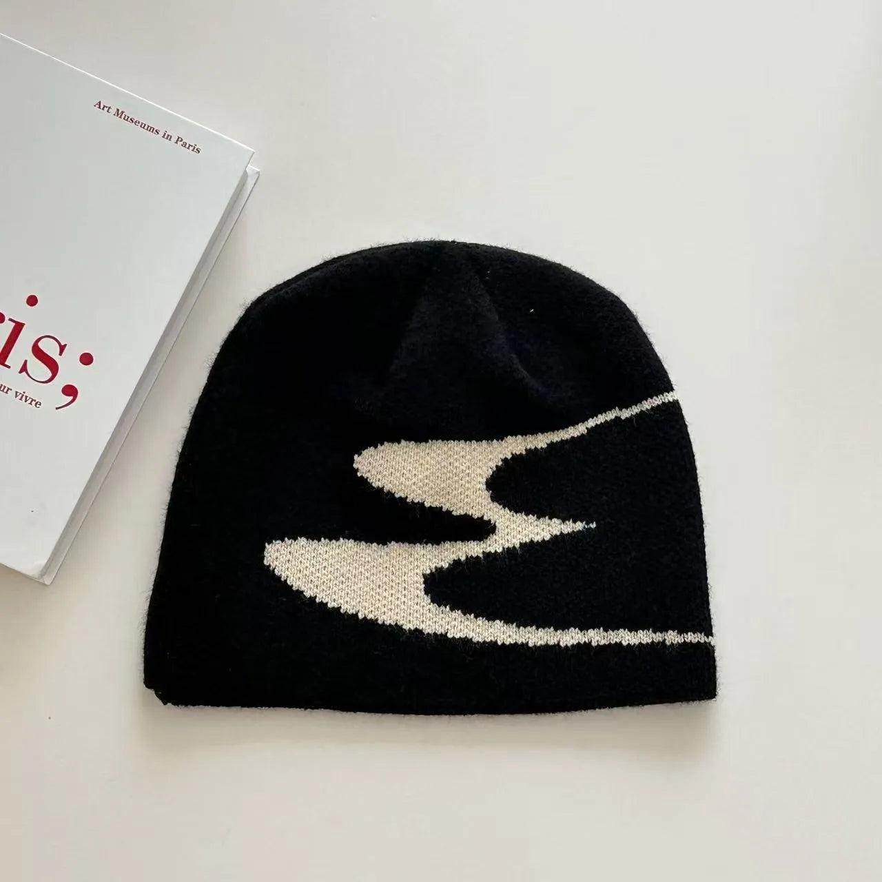 Acrylic thermal beanie hat in black, grey, or white colours for autumn and winter wear