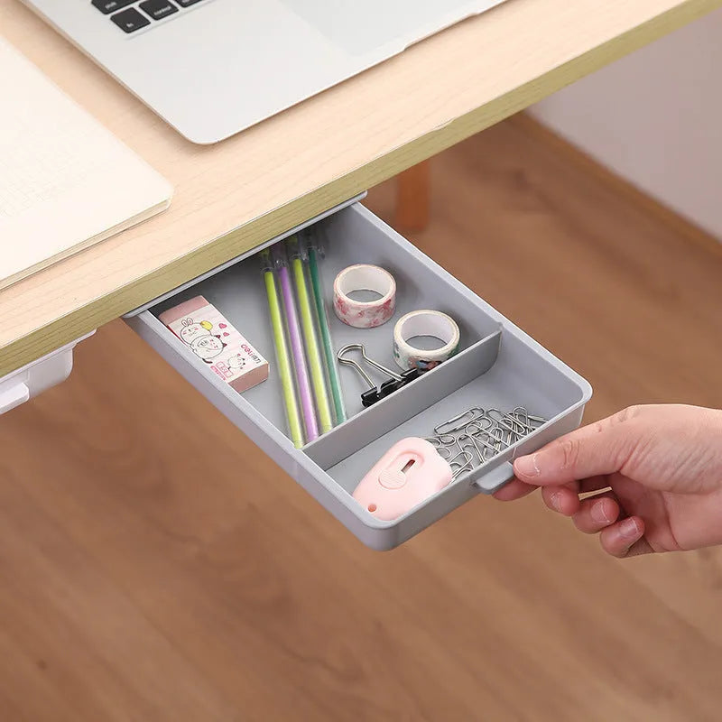 White plastic under table storage box with drawer lid and adhesive base for hidden organisation
