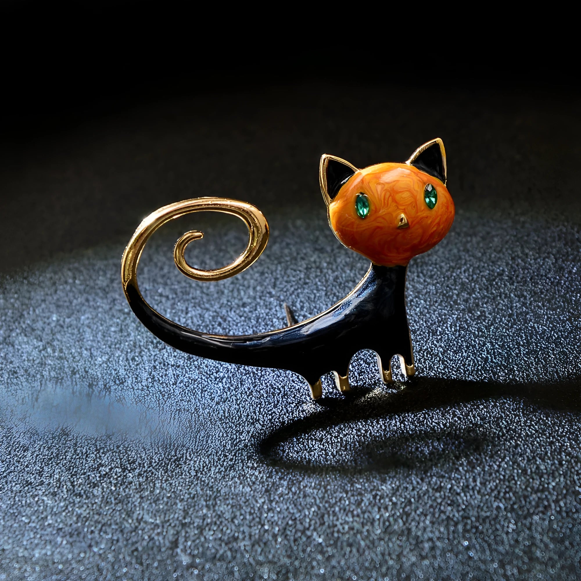 Personalised white and orange alloy cat brooch with painted detailing and a long tail.
