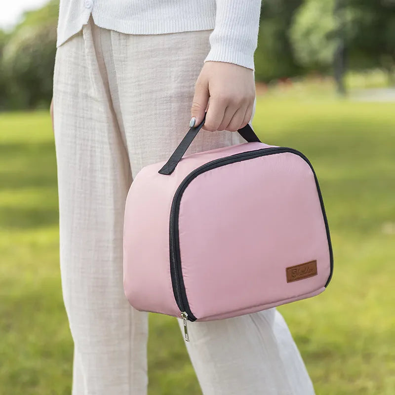 Textured cloth insulated lunch bag in sapphire blue colour with large capacity for a bento box.