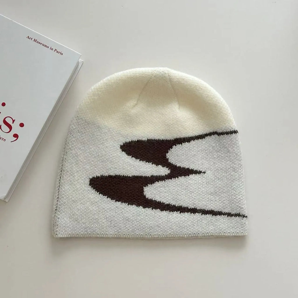Acrylic thermal beanie hat in black, grey, or white colours for autumn and winter wear