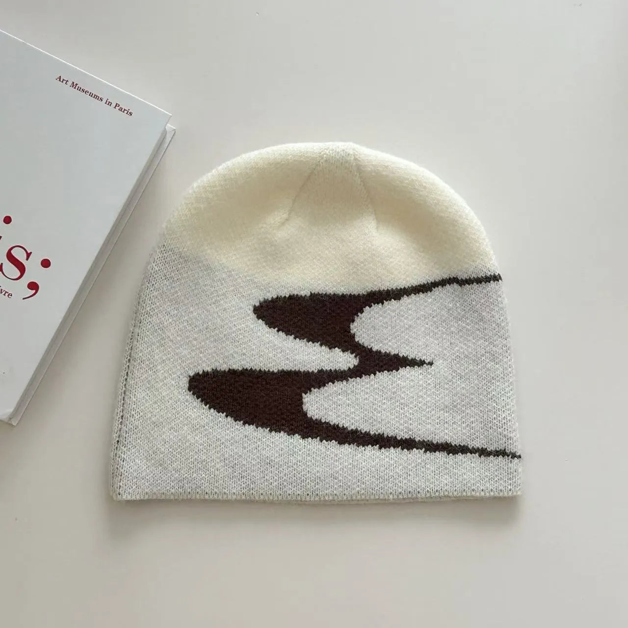 Acrylic thermal beanie hat in black, grey, or white colours for autumn and winter wear