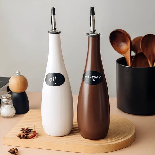 Ceramic oil pot with stainless steel funnel in black, coffee brown, or white finish.