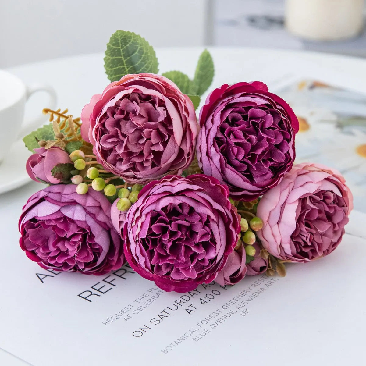 Artificial silk peony flower bouquet in champagne and sand red colours for home decor.