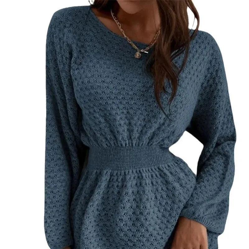 Blue women's knitted dress with crocheted flower detail and fitted waist