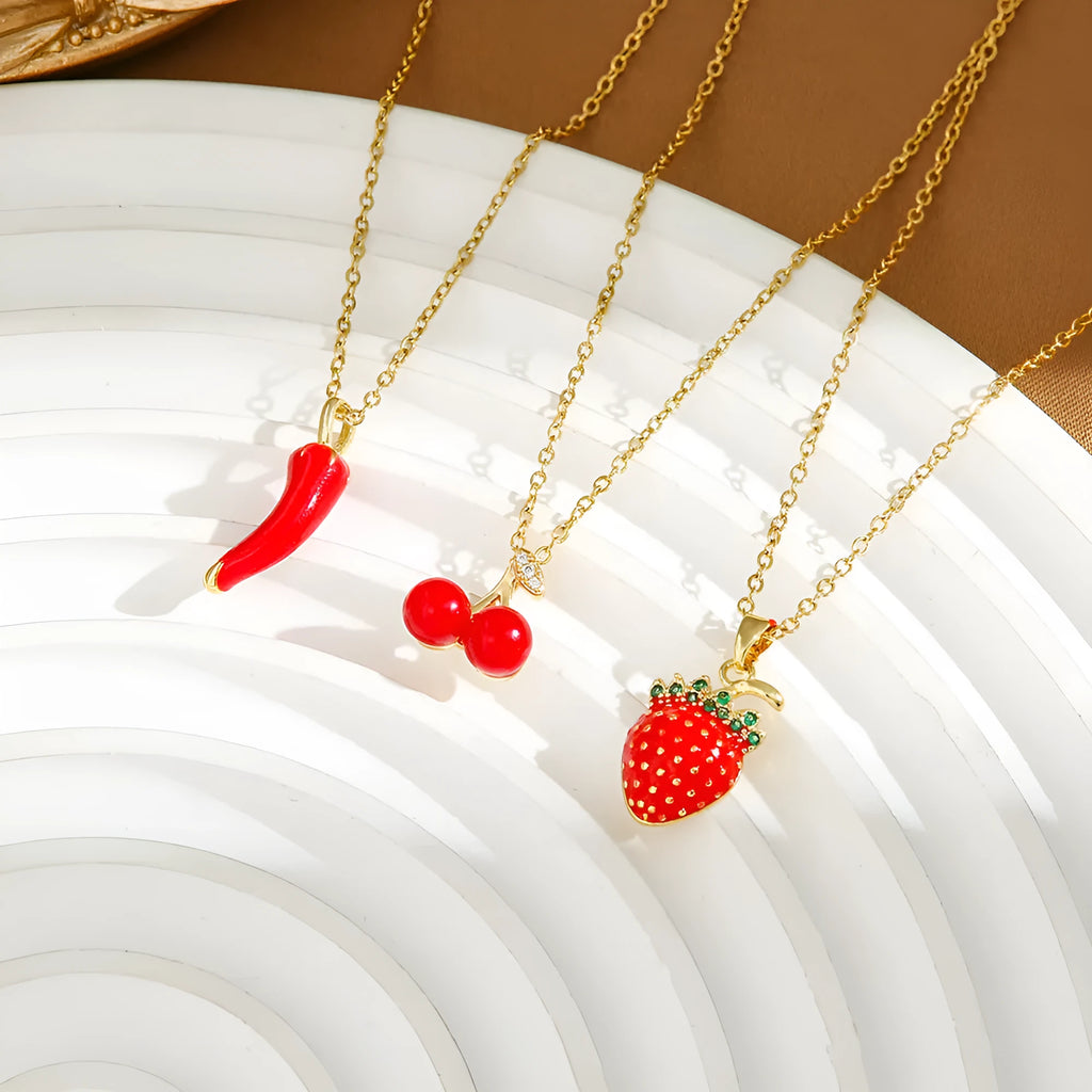 Titanium steel women's necklace with golden cherry pendant and O-ring chain design