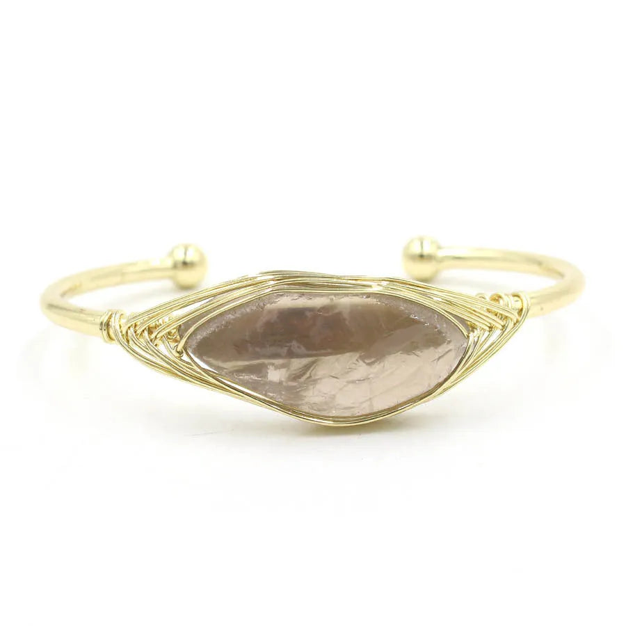 Natural raw gemstone bracelet with winding crystal design showing 8mm stones in various colours
