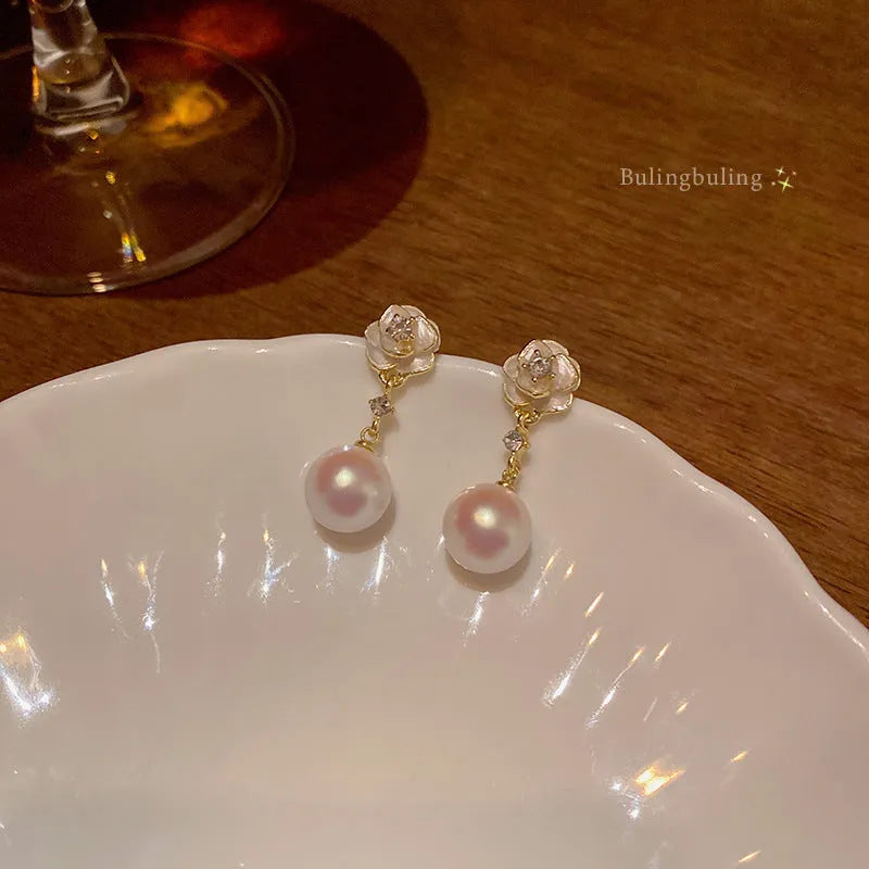 Camellia flower stud earrings for women with alloy blossom design