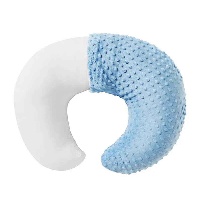 Nursing pillow with integrated spill barrier in a choice of pink, yellow, grey, or light blue colours.