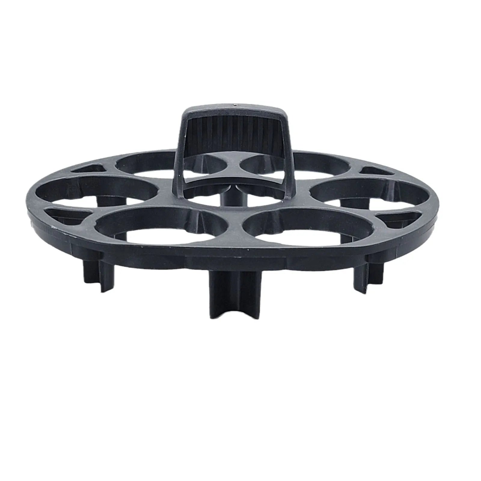 Black plastic egg holder basket rack for a cooking machine on a white background.